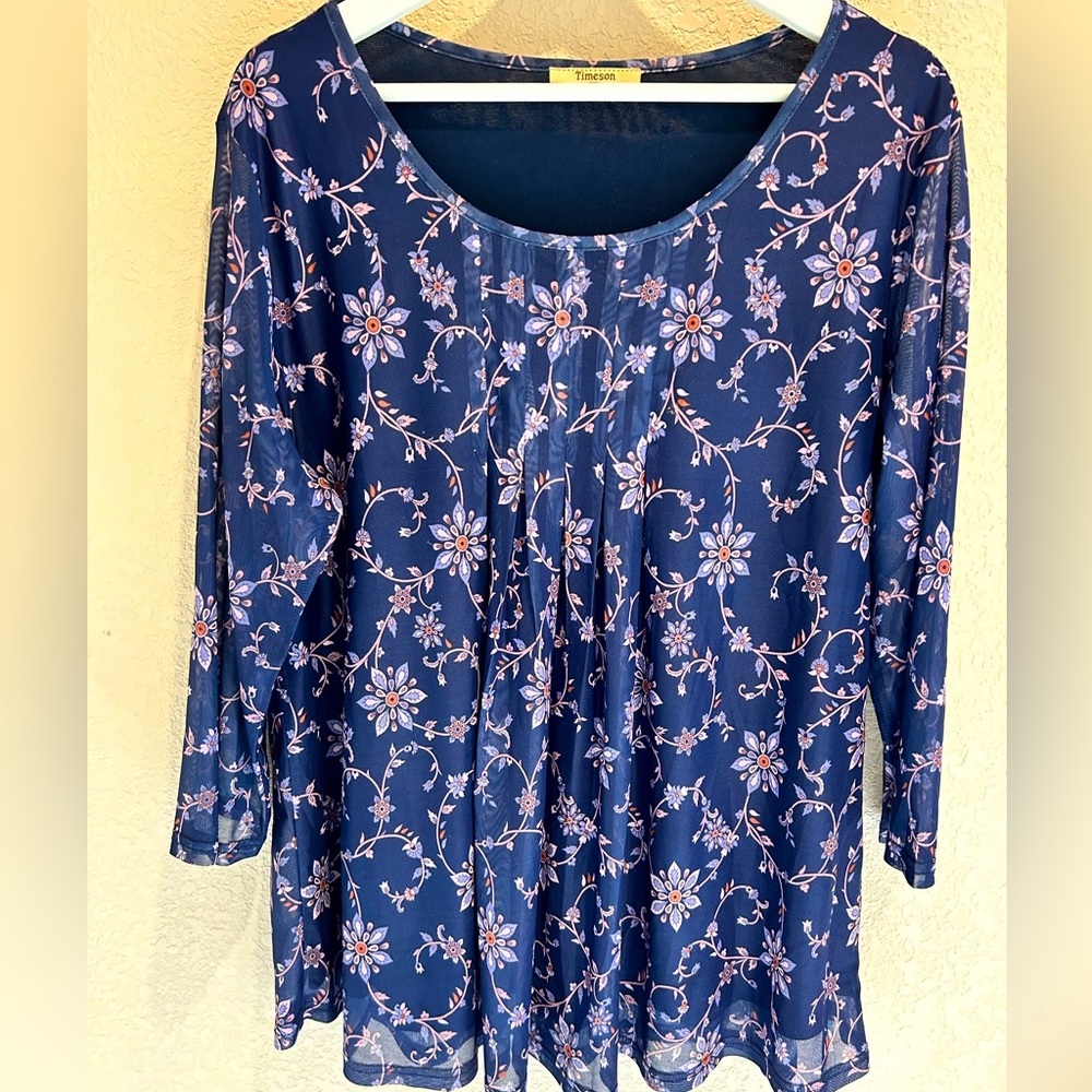SALE! BRAND NEW Graceful floral blouse featuring a sheer floral overlay.